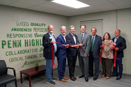 The ribbon cutting at the Penn Highlands Centre County location in Bellefonte, PA. Left to right: Mark Higgins, Centre County Commissioner Chair; Greg Scott, President & CEO of the CBICC; Ralph Stewart, Borough of Bellefonte Manager; Dr. Steve Nunez, President of Pennsylvania Highlands Community College; Greg Winger, Pennsylvania Highlands Community College Board of Trustees Chairperson; Marissa Davis, Regional Center Director at Pennsylvania Highlands Community College; and Kerry Benninghoff, District 171 Pennsylvania State Representative.