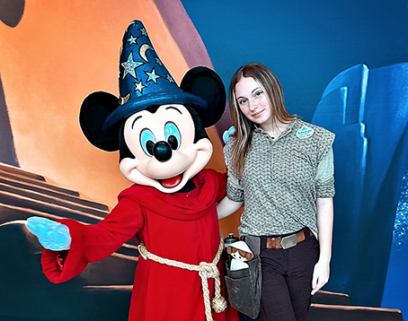 Former Penn Highlands student Cassidy Dusack and Mickey Mouse at Disneyland